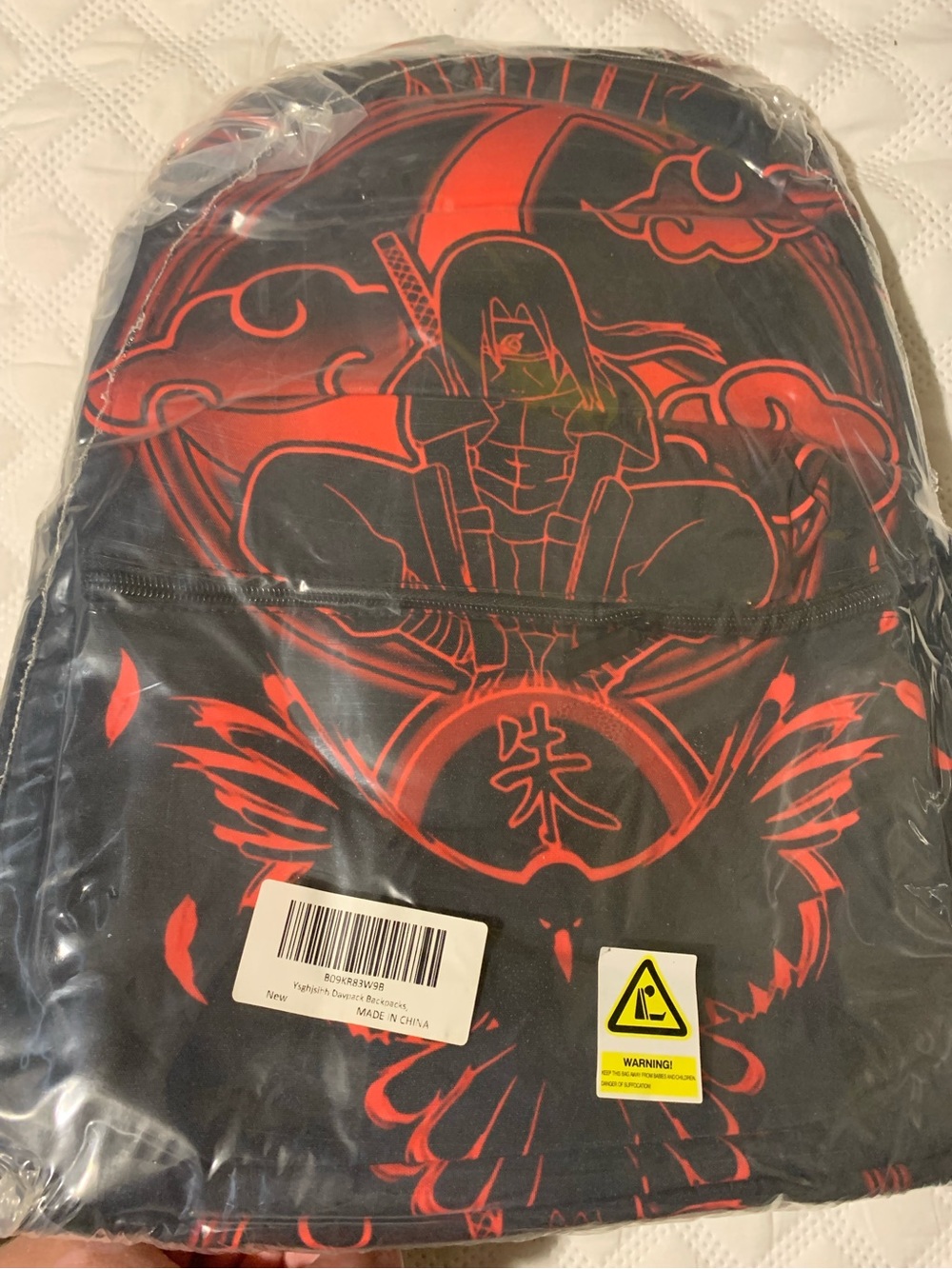 BACKPACK W/Itachi surrounded by Red Akatsuki Clouds